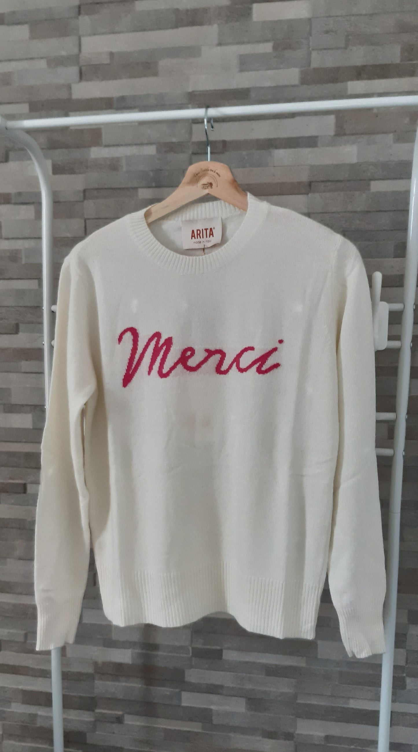 Maglione scritta "Merci"